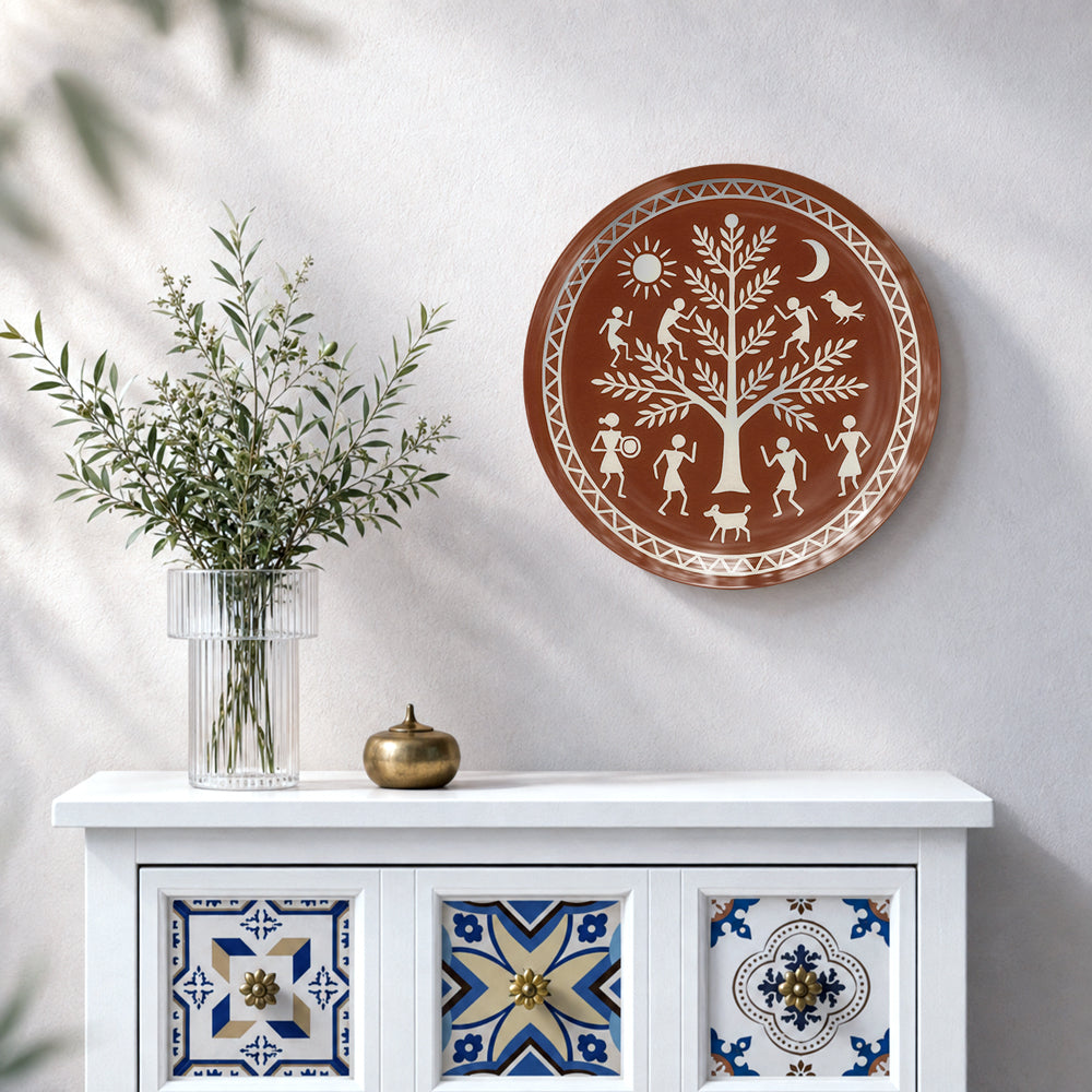 Indian heritage ceramic wall plate featuring Warli figures, symbolic tree, animals and nature