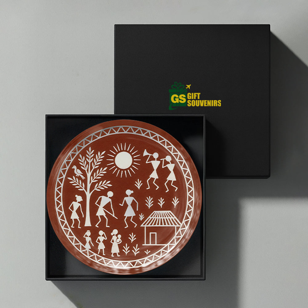 Premium Warli heritage ceramic wall plate featuring traditional village storytelling and Indian folk art